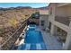 Pool with hot tub, lounge chairs, seating area, and outdoor dining on the patio at 1968 Regal Bluff Dr, Henderson, NV 89052