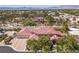 Aerial view of the luxury home showcasing the unique architecture and landscaping at 2101 Strada Mia Ct, Las Vegas, NV 89117