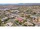 Real estate showcasing an aerial view of neighborhood and home with red tiled roof at 2101 Strada Mia Ct, Las Vegas, NV 89117