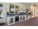 Outdoor kitchen area equipped with stainless steel appliances and stone countertops at 2101 Strada Mia Ct, Las Vegas, NV 89117