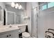 Bathroom featuring a glass door shower, toilet, and sink at 2726 Manteno Ct, Henderson, NV 89052