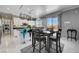 Kitchen with island seating and adjacent dining area at 2726 Manteno Ct, Henderson, NV 89052