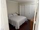 Cozy bedroom featuring a comfortable bed, closet, and natural light at 2796 Cape Hope Way, Las Vegas, NV 89121