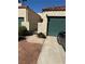 Charming home featuring a gated entrance, two-car garage, and desert-friendly landscaping at 2796 Cape Hope Way, Las Vegas, NV 89121