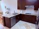 Modern kitchen features stainless steel appliances, granite counters, and custom cabinets at 2796 Cape Hope Way, Las Vegas, NV 89121