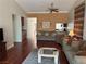 Spacious living room featuring hardwood floors, neutral decor, and comfortable seating at 2796 Cape Hope Way, Las Vegas, NV 89121
