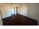 Bedroom with dark wood-look floors and a large closet at 2966 Juniper Hills Blvd # 102, Las Vegas, NV 89142
