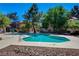 Enjoy a refreshing dip in the sparkling community pool surrounded by lush landscaping and mature trees at 2966 Juniper Hills Blvd # 102, Las Vegas, NV 89142