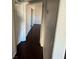 Hallway featuring dark wood floors and neutral paint tones at 2966 Juniper Hills Blvd # 102, Las Vegas, NV 89142