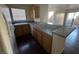 Well-lit kitchen featuring granite counters, and generous counter space at 2966 Juniper Hills Blvd # 102, Las Vegas, NV 89142
