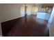 Bright living room with dark wood floors, neutral paint, and plenty of room to entertain at 2966 Juniper Hills Blvd # 102, Las Vegas, NV 89142