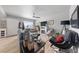 Bright living room featuring hardwood floors, modern decor, and a cozy fireplace at 320 Shadybrook Ln # D, Las Vegas, NV 89107