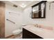 Bathroom with modern vanity, granite countertop, and accessibility features at 3287 Southridge Ave, Las Vegas, NV 89121