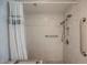 This accessible bathroom features a shower with grab bars and sleek fixtures for safety and style at 3287 Southridge Ave, Las Vegas, NV 89121