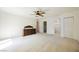 Large bedroom with ceiling fan and view into the attached bathroom and closet at 3287 Southridge Ave, Las Vegas, NV 89121