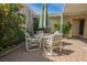 Inviting patio with a table and chairs, perfect for outdoor dining and relaxation at 3287 Southridge Ave, Las Vegas, NV 89121