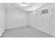 Basement space with new carpet, a small window, and an air conditioning unit at 3929 Torsby Pl # 3929, Las Vegas, NV 89119