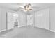 Bedroom features ceiling fan, closet, and doorways to ensuite and hall at 3929 Torsby Pl # 3929, Las Vegas, NV 89119