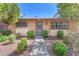 Charming single story home featuring brick and lush landscaping at 3929 Torsby Pl # 3929, Las Vegas, NV 89119