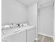 The laundry room features new matching washer and dryer units with easy access at 3929 Torsby Pl # 3929, Las Vegas, NV 89119