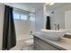 Contemporary bathroom featuring a stylish vessel sink, modern fixtures, and a tub-shower combo at 4121 Satinwood Dr, Las Vegas, NV 89147