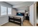 Cozy bedroom with a comfortable bed, soft carpet, and bright natural light at 4121 Satinwood Dr, Las Vegas, NV 89147