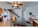 Open concept living with a view from the kitchen to the staircase and the eating area at 4121 Satinwood Dr, Las Vegas, NV 89147