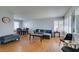 Open living room featuring dining area and shuttered windows at 4121 Satinwood Dr, Las Vegas, NV 89147