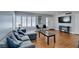 Inviting living room featuring hardwood floors, and shuttered windows at 4121 Satinwood Dr, Las Vegas, NV 89147