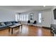 Inviting living room featuring hardwood floors, and shuttered windows at 4121 Satinwood Dr, Las Vegas, NV 89147