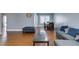 Open living room and dining area with wood floors and neutral paint at 4121 Satinwood Dr, Las Vegas, NV 89147