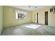 Bright bedroom featuring a large window and spacious closet at 416 Wyoming St, Boulder City, NV 89005