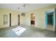 Sunlit bedroom with closet, ceiling fan and en-suite bathroom access at 416 Wyoming St, Boulder City, NV 89005