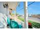 Inviting front porch with seating, flower pots, and street view at 416 Wyoming St, Boulder City, NV 89005