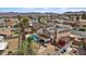 The home's pool and solar panels are nicely displayed from this aerial view of its neighborhood at 429 Sunburst Dr, Henderson, NV 89002