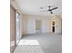 A bright bedroom featuring neutral walls, carpet, a sliding glass door and a closet at 429 Sunburst Dr, Henderson, NV 89002
