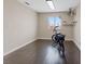Clean bedroom featuring wood floors, a window, and space for personalized decor at 429 Sunburst Dr, Henderson, NV 89002