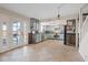 View of open kitchen featuring custom cabinets, modern appliances and access to living area at 429 Sunburst Dr, Henderson, NV 89002