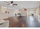 Spacious living room boasting dark hardwood floors and lots of natural light at 429 Sunburst Dr, Henderson, NV 89002