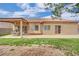Property featuring a covered patio and spacious backyard area at 4322 Summers Shade St, Las Vegas, NV 89147