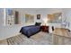Cozy bedroom featuring a window, a single bed, a desk, and playful world map decor at 4322 Summers Shade St, Las Vegas, NV 89147