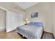 Bedroom featuring wood floors, a queen sized bed and double closets at 4322 Summers Shade St, Las Vegas, NV 89147