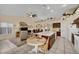 Open-concept kitchen flowing into the living room, complete with a large island and casual dining area at 4322 Summers Shade St, Las Vegas, NV 89147