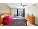 Comfortable bedroom with natural light from the sliding glass door and dresser at 4555 E Sahara Ave # 120, Las Vegas, NV 89104