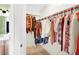 Walk-in closet with ample hanging space and shelving for organized storage of clothing and accessories at 4555 E Sahara Ave # 120, Las Vegas, NV 89104
