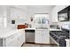 Kitchen featuring white cabinets, a stainless steel appliances and a window view at 4555 E Sahara Ave # 120, Las Vegas, NV 89104