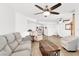 Bright living room with comfortable seating, ceiling fan and direct access to the kitchen at 4555 E Sahara Ave # 120, Las Vegas, NV 89104