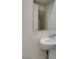 Bathroom with pedestal sink and mirror at 4790 Equinox Sky Ave # 2, North Las Vegas, NV 89084