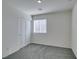 Neutral bedroom featuring carpet and window at 4790 Equinox Sky Ave # 2, North Las Vegas, NV 89084