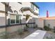 Charming front entrance with a stone walkway and desert landscaping at 4790 Equinox Sky Ave # 2, North Las Vegas, NV 89084